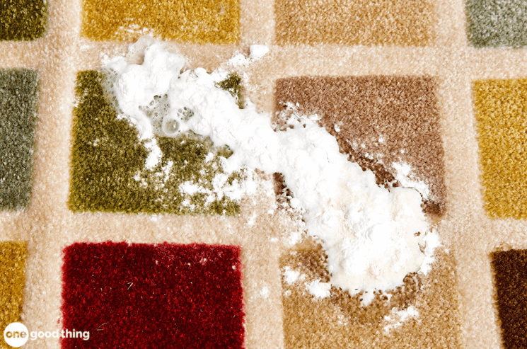 Pet Stain Remedy step 2: sprinkle baking soda generously over the vinegar on the carpet dog pee stain.