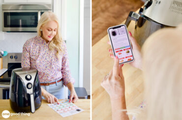 collage of two images showing a woman in a kitchen standing over a butcher block counter with a black air fryer and looking at an air fryer cheat sheet and looking at a phone showing the air fryer cheat sheet