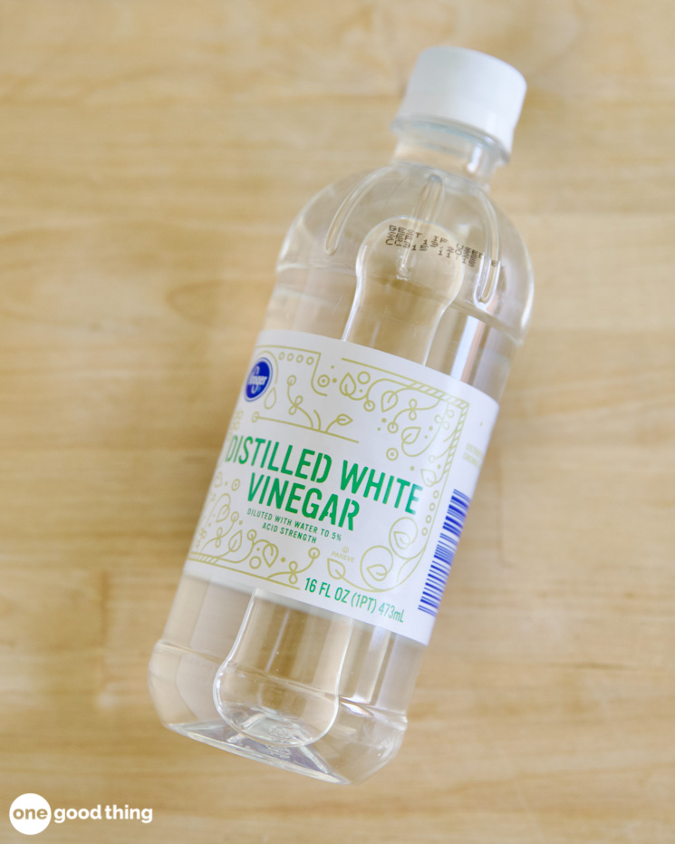 A bottle of distilled white vinegar.