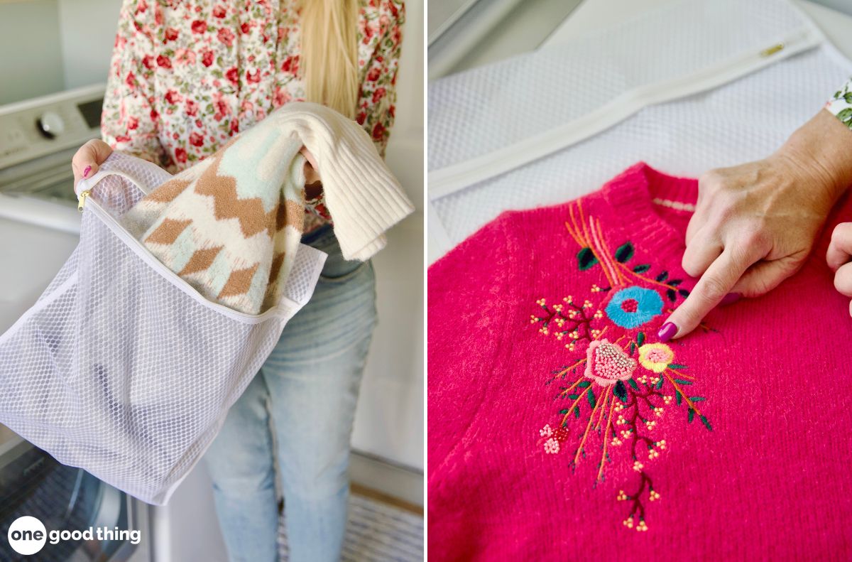 A woman is placing a sweater into a mesh laundry bag. Pointing out embroidery on a sweater.