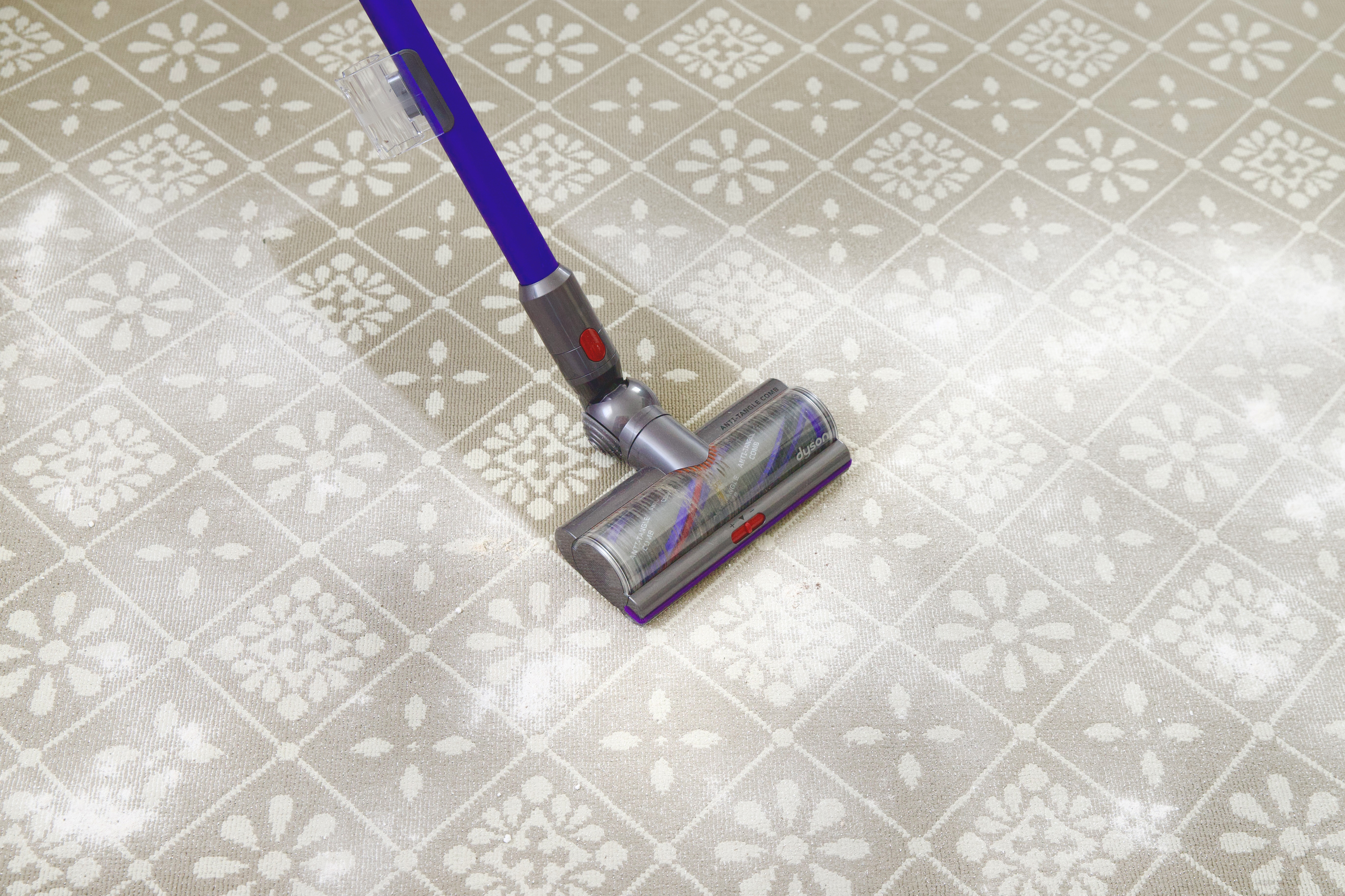 vacuum taking powder off rug