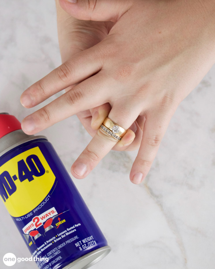 Uses for WD-40 - woman trying to get rings off her finger