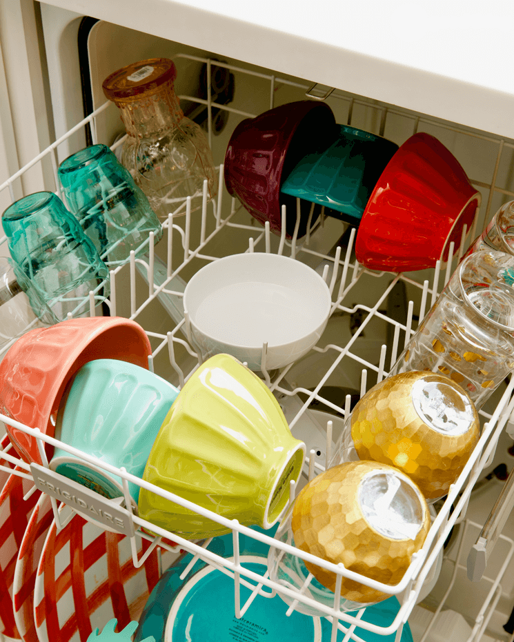 A bowl of vinegar in the top rack of the dishwasher helps prevent spots from hard water in the dishwasher.